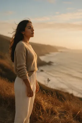 Solitary Woman on Coastal Bluff Horizon
