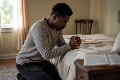 Young Man Kneeling in Quiet Prayer