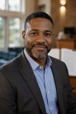 Warm Smiling Pastor Portrait Indoors