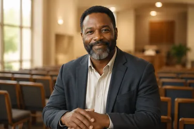 Warm Smiling Pastor Portrait Indoors