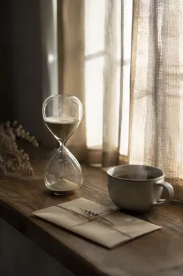 Hourglass and Tea in Morning Light