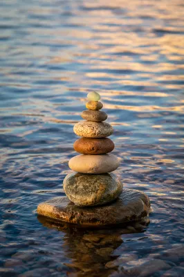 Peaceful River Stones in Still Water