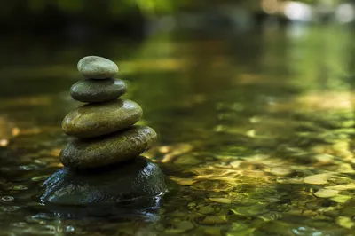 Peaceful River Stones in Still Water