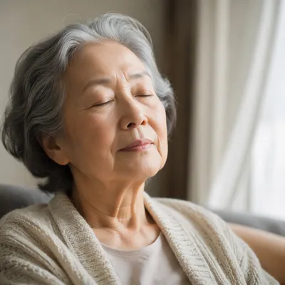 Peaceful Elderly Woman by Window Close Up