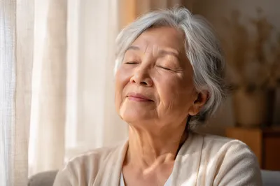 Peaceful Elderly Woman Resting by Window