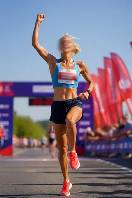 Determined Runner Crossing Finish Line in Hope