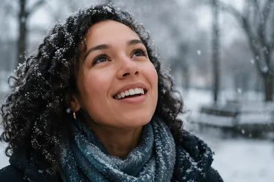 Joyful Woman in First Snowfall Close-Up