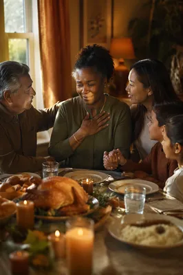 Grateful Family Gathering at Dining Table