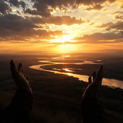 Praise Hands Raised Beneath Golden Sunset Sky