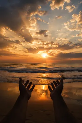Praise Hands Over Golden Sunset Ocean