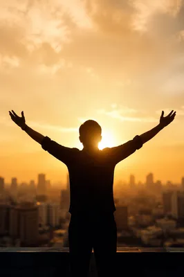 Praise Hands Lifted at Golden Sunset