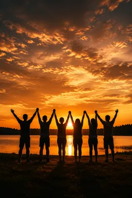 Praise Hands Lifted at Golden Sunset