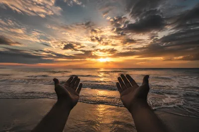 Praise Hands at Golden Ocean Sunset