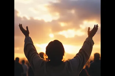 Raised Hands in Golden Sunset Praise