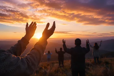 Raised Hands in Golden Sunset Praise