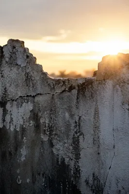 Redemption Sunrise Over a Broken Wall