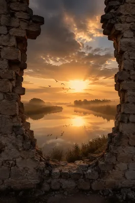 Redemption Sunrise Beyond a Broken Stone Wall