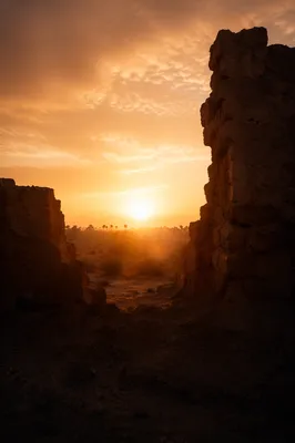 Redemption Sunrise Beyond Broken Desert Wall