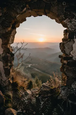 Redemption Sunrise Through Broken Stone Wall