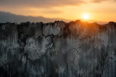 Redemptive Sunrise Over a Broken Wall