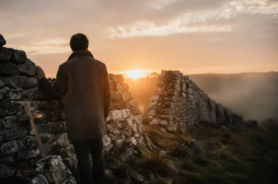 Redemption Sunrise Beyond a Broken Stone Wall
