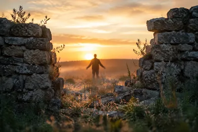 Redemption Sunrise Through Broken Stone Wall