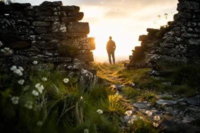 Redemption Sunrise Beyond a Broken Stone Wall