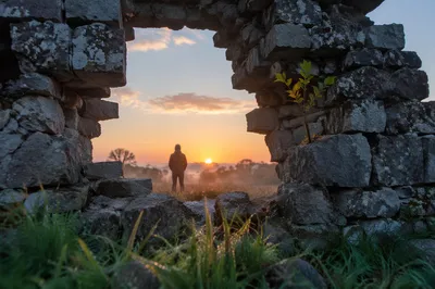 Redemption Sunrise Beyond a Broken Wall