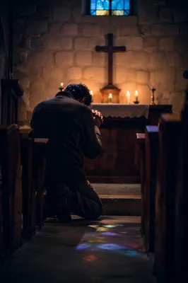 Kneeling in Repentance at Church Altar
