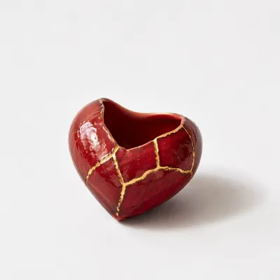 Restored Crimson Heart Vessel with Gold Seams