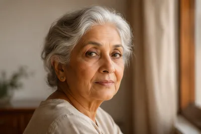 Elderly South Asian Woman by Sunlit Window