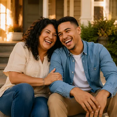 Laughing Adult Siblings on Front Steps