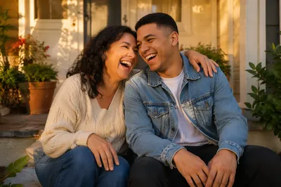 Adult Siblings Laughing on Front Steps