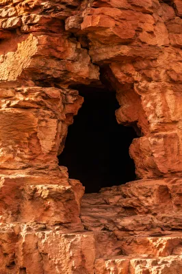 Rugged Sandstone Wall of Enduring Faith