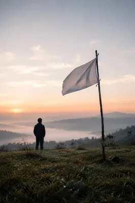 White Flag of Surrender at Sunrise