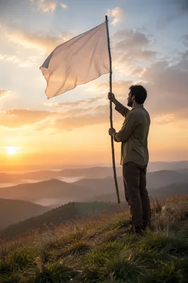 Solitary Figure Raising White Flag at Sunrise