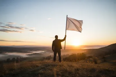 White Flag Surrender at Sunrise Hilltop