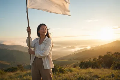 Woman Raising White Flag at Sunrise