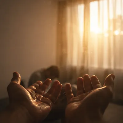 Tearful Open Hands in Sunrise Light