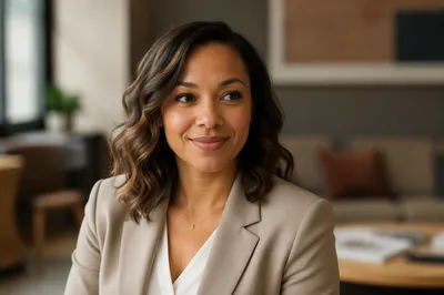 Warm Professional Woman in Office Lounge
