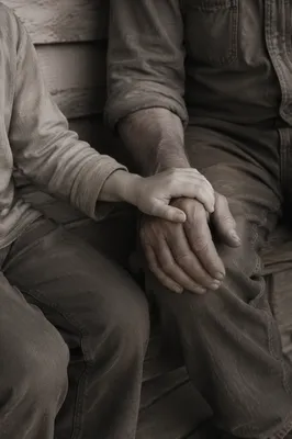 Child Holding Adult Hand in Trust