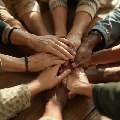 Diverse Hands Stacked in Unity Circle