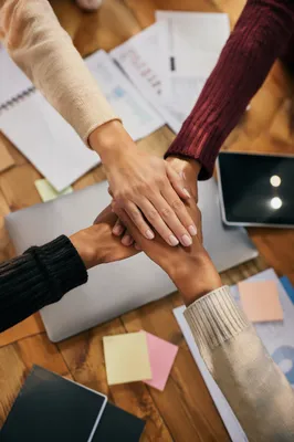 Diverse Hands Stacked in Team Unity