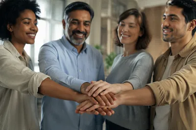 Diverse Coworkers Stacking Hands in Unity