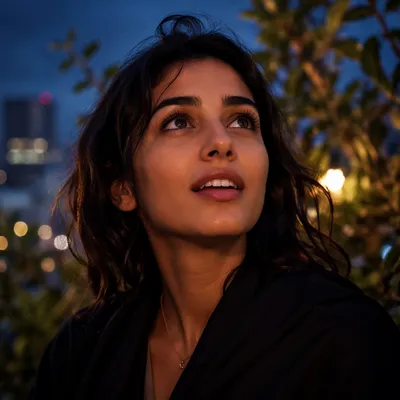 Awestruck Woman Looking Up at Blue Hour