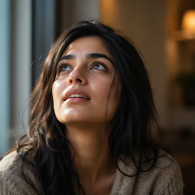 Awestruck Woman Looking Up by Window