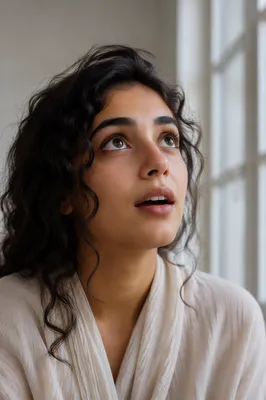 Awestruck Woman Looking Up Indoors