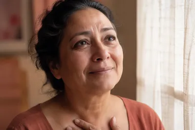 Teary Eyed Woman by Window