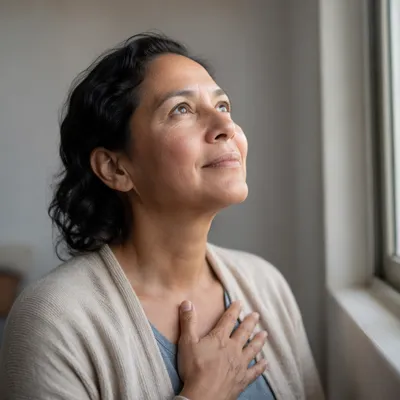 Hopeful Woman Looking Up by Window