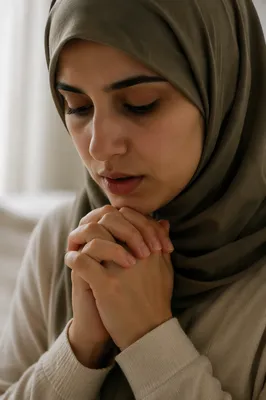 Close-Up Portrait of Woman in Prayer